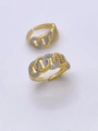 Macro detail of two-tone gold and silver Cuban ring with twisted rope texture and pavé crystals - Ring