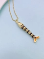 Macro view of articulated fish pendant with gold frame and vibrant enamel details - Brown Body Orange Tail Style (Necklace N)