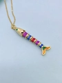 Macro shot of colorful enamel articulated fish pendant with gold plating and green zircon eye - Multicolor Patchwork Style (Necklace O)