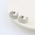 Macro detail of silver twisted rope C-shaped hoop earrings with embedded white pearls - Silver Tone Pearl (CK359)