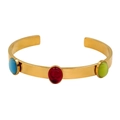 Close-up of gold-plated bangle featuring three oval gemstones in blue red and green - Gold (Multicolor Zirconia)