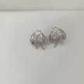 Detailed macro view of silver angel wing stud earrings with sparkling cubic zirconia stones - Wing Style (Earring 01) / Silver