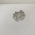 Macro shot of silver petal earrings featuring textured metal and teardrop zircon stones - Petal Style (Earring 02) / Silver
