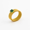 Detail of mesh gold ring with a rectangle emerald green zircon in 45-degree angle - US 7 / Green