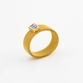 Close-up of golden mesh band ring featuring two parallel rectangular zircon stones - US 7 / White