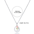 Detail view of pearl pendant with rose enamel decor and 40+6cm chain specs - Rose Pearl Teardrop Necklace (X0516)