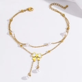 Doppelreihiges goldenes Fußkettchen mit weißem Schmetterlingsanhänger und Perlen - Schleife Perlmutt Stil (TL0028)
