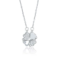 Macro detail of silver clover pendant with heart-shaped sparkling cubic zirconia - Heart Spliced Four-Leaf Clover Style (X0001) / Steel