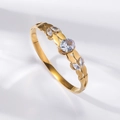 Detail of gold titanium steel bangle showing wavy cutout design and sparkling cubic zirconia - Wave Hollow Clear Zircon Style (TT0875)
