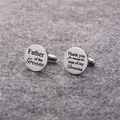 Detailed macro view of silver steel wedding cufflinks engraved for Father of the Groom - Father of the Groom (Silver)