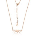 Detail of rose gold triple heart pendant with 18KGP engraving on the necklace extension - Rose Gold (N461)