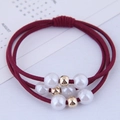 Three-strand burgundy elastic hair tie with white pearls and gold beads on a calendar - Dark Wine Red (090520267)
