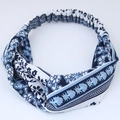 Elastic bohemian blue and white silk crossover headband for yoga and facial washing - Celadon