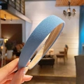 Detail of matte fog blue headband featuring grainy fabric texture and wide padded design - Fog Blue Frosted (7#)
