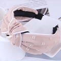 Elegante cerchietto largo annodato in rosa cipria con ricamo bianco e bordatura bianca - Rosa nudo