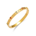 Close-up of golden titanium steel bangle with emerald-cut colored stones and vintage engraving - Gold Rectangular Colorful Stones Style (TT0370)