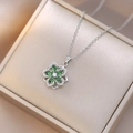 Detail of silver flower pendant necklace with green drop-shaped petals and zircons - Silver Emerald Green Floral Style (X0704) / Silver