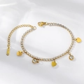 Detail of a gold titanium bracelet featuring polished heart charms and clear zircon stones - Heart Tennis Chain Style (TT1061)