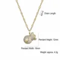 Detailed view of a gold money bag pendant necklace with cubic zirconia and $ symbol - Gold Money Bag Style (X3936) / Gold