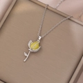 Close-up of tulip pendant necklace with yellow gemstone and shimmering pavé diamonds - Tulip Necklace (X3767) / Lemon Yellow