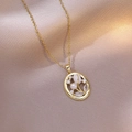 Elegant gold tulip pendant necklace with pearl and rhinestones on silk background - Tulip (X3824)