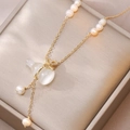 Elegant gold necklace with gourd stone pendant and white freshwater pearls design - Hulu Freshwater Pearl Necklace (X3676)