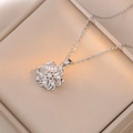 Elegant floral heart necklace with zircon inlay on a champagne satin display box - Steel Color Multi-Layer Petal Zirconia Style (X0638)