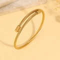 Elegant gold twisted cable open cuff bracelet with spiral texture and spherical ends - Gold Style (TT0052)