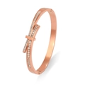 Elegant rose gold geometric bangle for women with micro-pave crystals in crossover design - Rose Gold Bow Knot Style (TT0667)