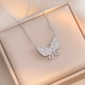 Silver butterfly pendant necklace with sparkling cubic zirconia on a satin lining - Silver Butterfly Necklace (X0735)