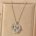 Heart pendant necklace with letter K and green zircons in luxury jewelry box - Hollow Heart Letter K Necklace / Silver