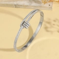 Silver titanium steel bangle with cubic zirconia stones and adjustable charm rings - Hollow Ring Clasp Micro-set Style (TT0825)