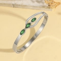 Titanium steel bangle with green marquise gems and white zircons on a marble base - Green Marquise Gemstone Hollow Style (TT0908)