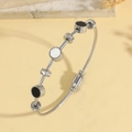 Minimalist silver steel wire rope bracelet with black and white enamel charms and pavé beads - Black and White Disk Steel Twisted Wire Style (TT0912)