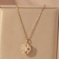 Elegant gold necklace with sparkling star pendant in a premium jewelry display box - Gold Star Round Hollow Style (X0651)