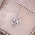 Silver bow necklace featuring heart-shaped zircons in a pink satin jewelry gift box - Steel White Heart Gemstone Bowknot Style (X2946)