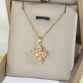 Collier fleur de bauhinia doré avec zircons roses et blancs dans un écrin à bijoux - Collier (X1310) / Or-Rose