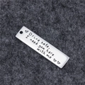 Silver Drive Safe I Need You Here keychain with heart engraving on gray felt background - Silver