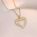 Minimalist heart-shaped gold necklace with sparkling white zircons on pink silk - Double Layer Hollow Heart Zirconia Style (X1546) / Gold