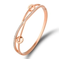 Brazalete de acero inoxidable oro rosa con números romanos y pavé de circonitas cúbicas - Rosa oro