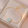 Adjustable golden chain bracelet with blue enamel daisy and marquise zircon accents - Ts0278-gold Blue