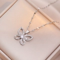 Elegant butterfly pendant necklace with zircon stones in a gold satin jewelry box - Butterfly Necklace