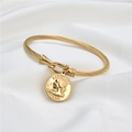 Detalle de una pulsera de cable de acero inoxidable dorado con moneda Liberty de 1978 - Estatua de la Libertad 1978 (Estilo 1) / Dorado