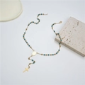 Vintage gold cross necklace with turquoise beads and saint medal on white background - Turquoise (Style 6)