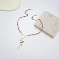 Detail of gold beaded cross necklace with red beads and religious medallion charm - Dark Red (Style 4)