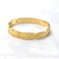 Elegant gold feather textured stainless steel bangle with side hinge closure - Snap-On / Gold