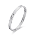 Silver titanium steel cuff bracelet featuring a hollow Greek Key pattern with side clasp - Silver
