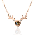Rose gold reindeer antler projection necklace with sparkling crystal and round gemstone - Rose Gold