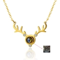 Golden reindeer antler projection necklace with I Love You in 100 languages stone - Gold