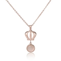 Rose gold crown necklace with pink crystal pendant on white mirror surface - Rose Gold Tone Pink Gemstone